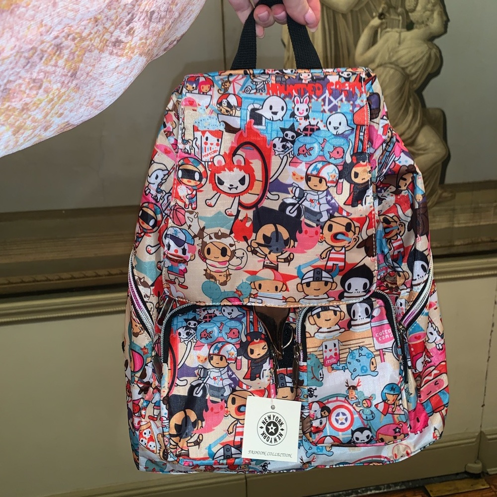 Pink cartoon (anime-ish) graphic backpack- tag on!